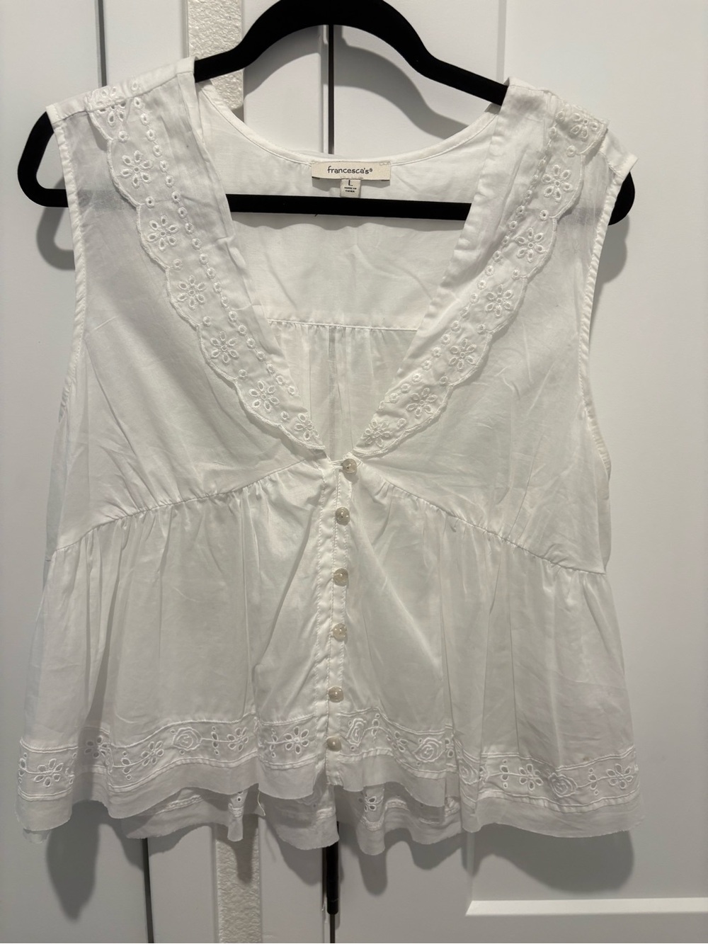 Francesca's Collections White Eyelet Button-Front Peplum Sleeveless Top